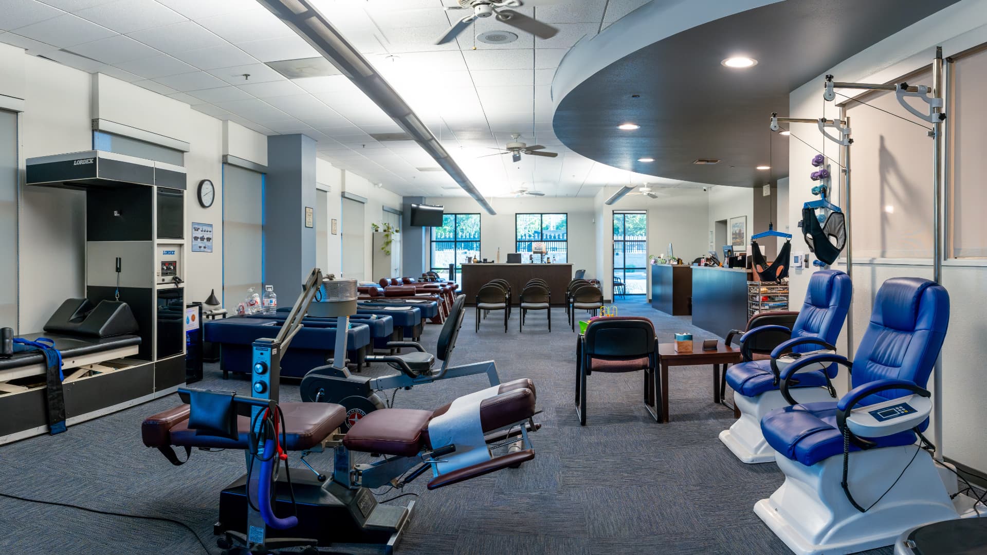 Rehabilitation floor with therapy tables at First Health Medical Center